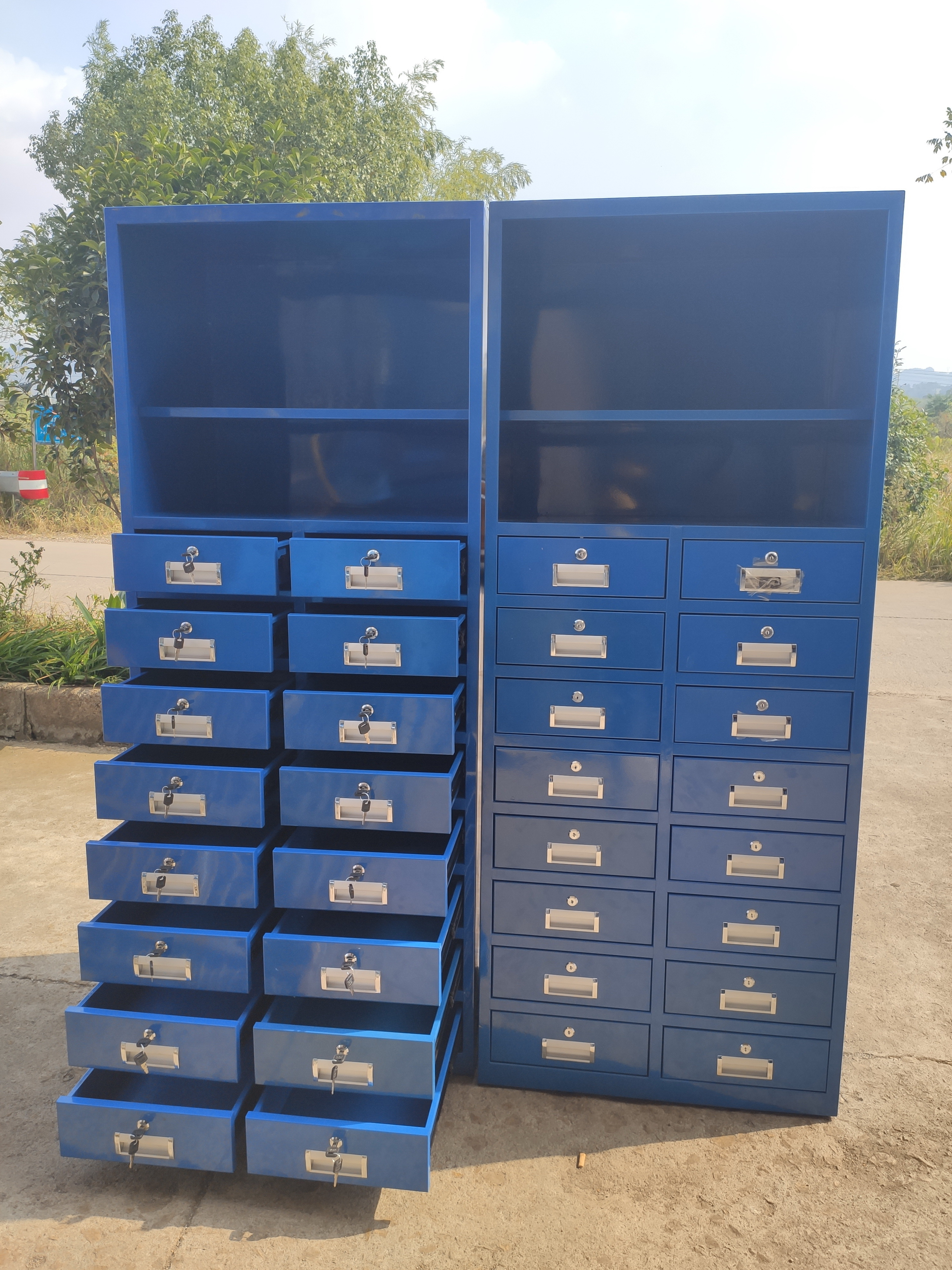 Metal tool cabinet with hook board used for workshop staff lockers