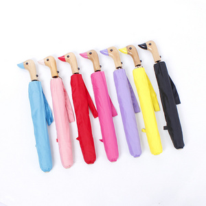 Two-fold duck head umbrella two-fold solid wood handle sunny umbrella foreign trade domestic sales duckling umbrella