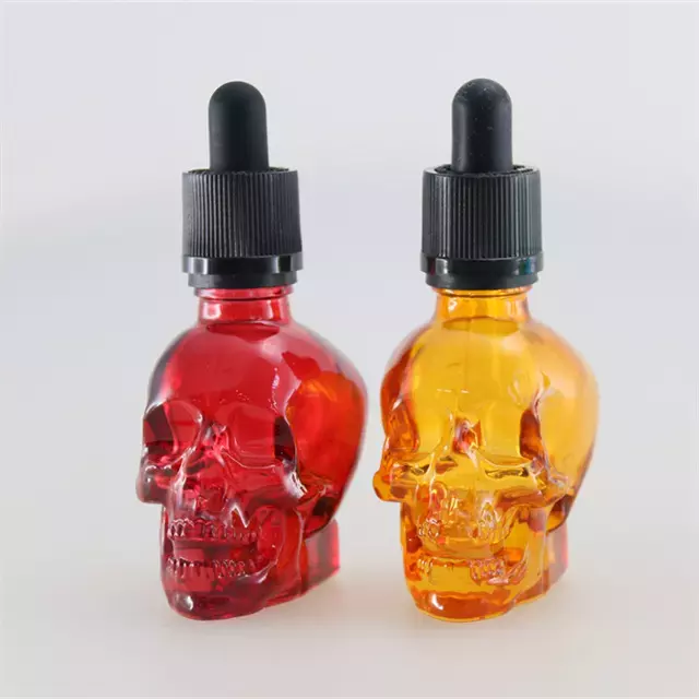 fancy perfume 15ml 30ml 60ml China supplier skull head shape glass skull 1oz glass beard oil dropper bottle for Wine container