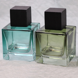 wholesale luxury 30ml 50ml 100ml custom color square glass perfume bottle with black wooden cap spray bottle with box packaging