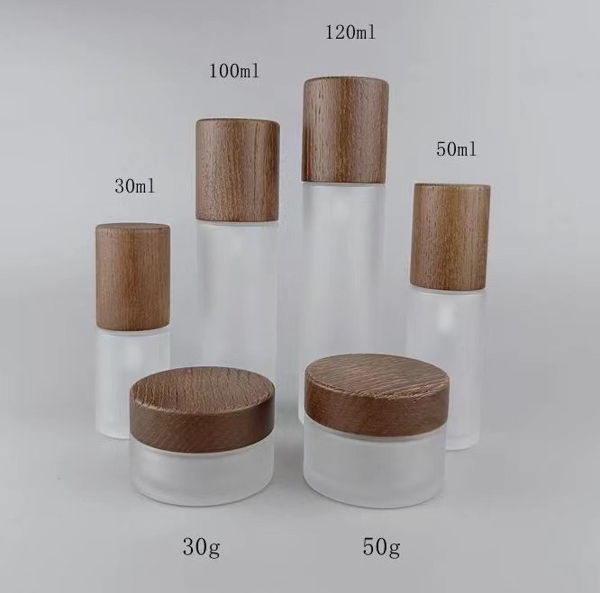 Wholesale 30g 50g 100g 150g2 00g 250g amber frosted bamboo glass bottles only bamboo lids bamboo lotion spray pump cap