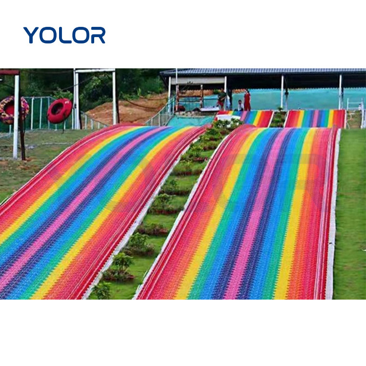 Custom amusement park playground large plastic dry snow slide rainbow slide in ground slide slope hill