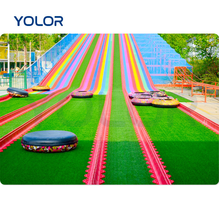 Custom amusement park playground large plastic dry snow slide rainbow slide in ground slide slope hill