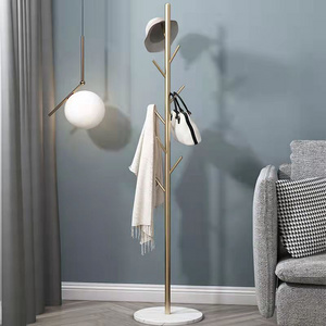 High quality household vertical wall hanging floating clothes hanger European light luxury floor type metal clothes hanger livin