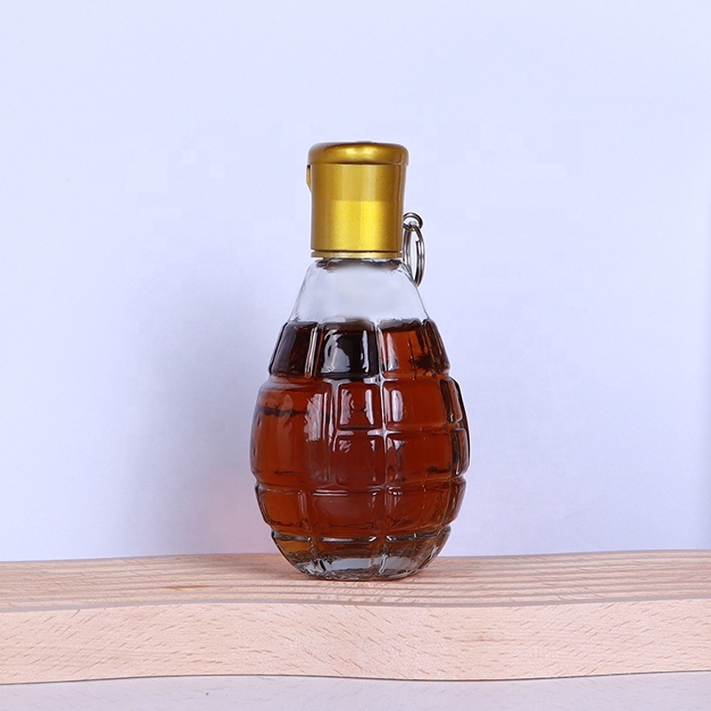 Customized 120ml hand grenade liquor unique shaped wine glass liquor bottle with cap