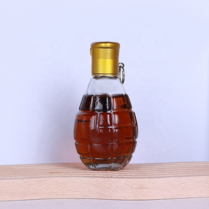 Customized 120ml hand grenade liquor unique shaped wine glass liquor bottle with cap