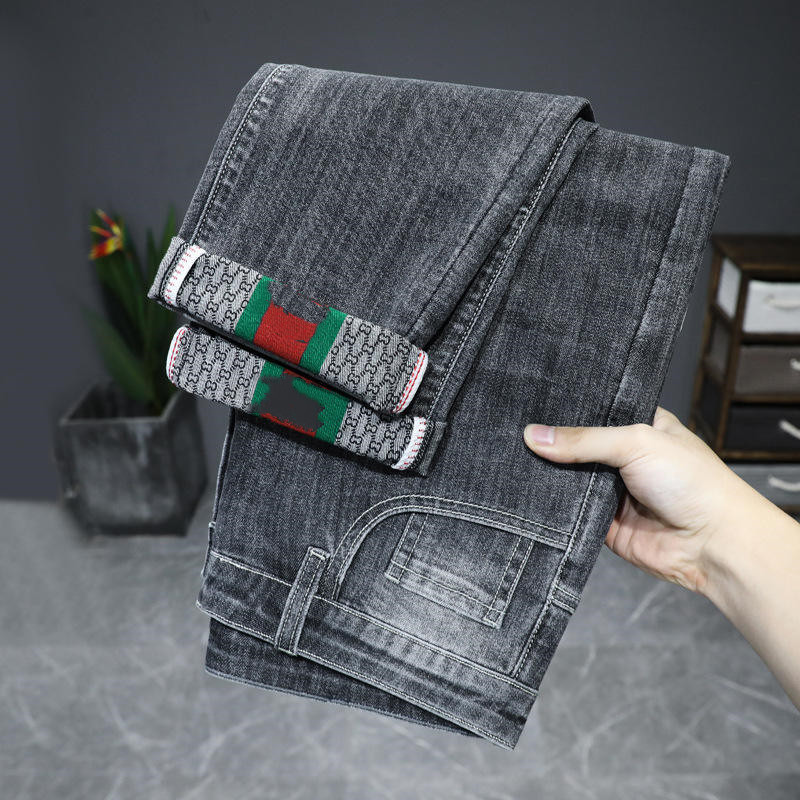 Autumn and winter new elastic business slim casual trend blue men and women  jeans stock