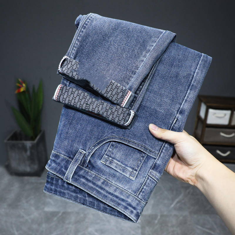 Autumn and winter new elastic business slim casual trend blue men and women  jeans stock