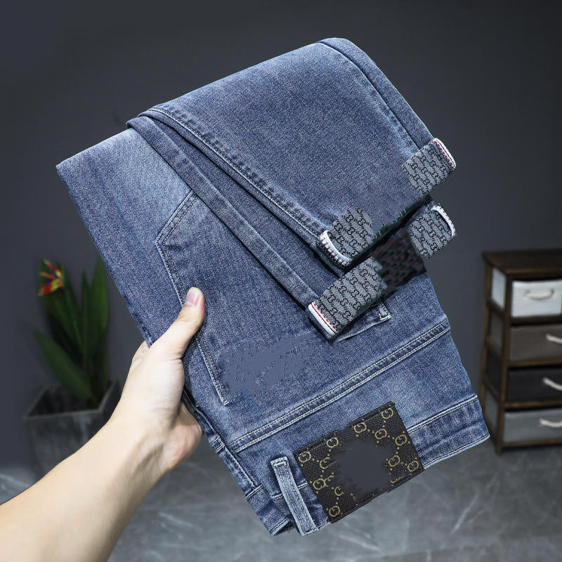 Autumn and winter new elastic business slim casual trend blue men and women  jeans stock