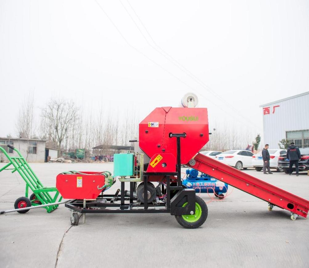 China manual hay baler machine small bale hay mini round baler with motor