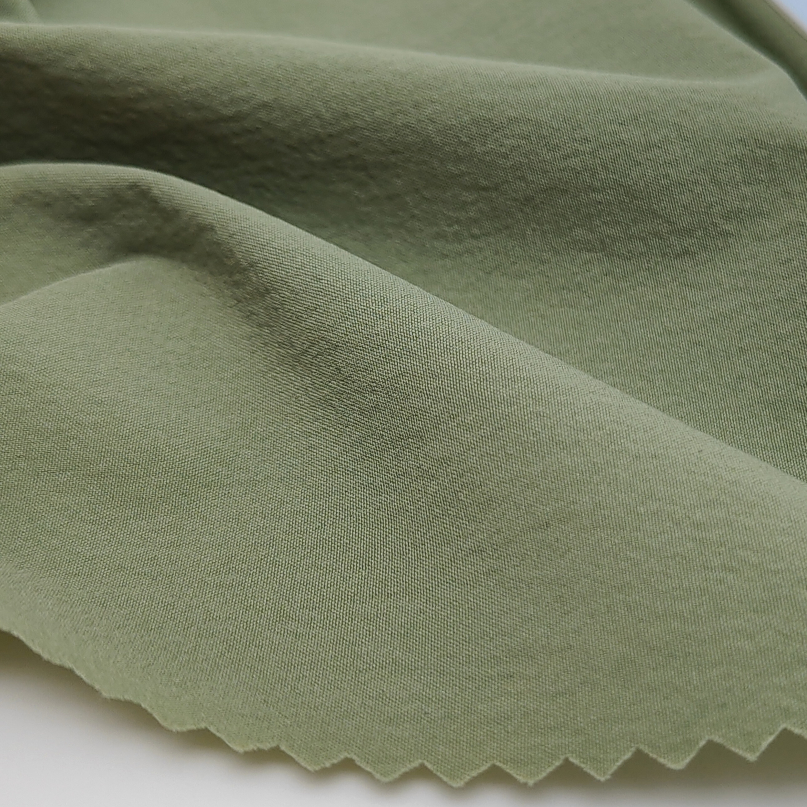 YY0035XP-05 3M Moisture-Absorbent wicking SP12%+N88% 70D nylon four-sided round bean green fabric for jacket