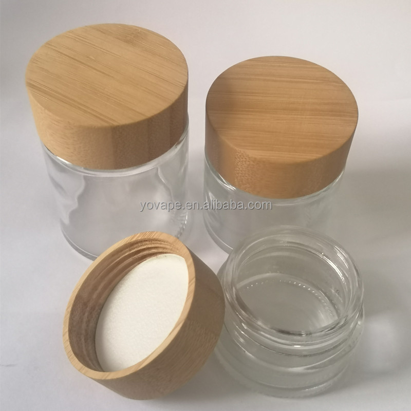 Eco-friendly hot sale 50ml 60ml 90ml 110ml 2 ounce 3 Oz 4Oz round food spice cookie storage clear glass jar with bamboo wood lid