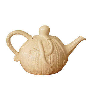 Creative Embossed Octopus Teapot Cute Ceramic Teapot Shaped as an Octopus 37.2 oz adds a nautical touch to your tea sessions