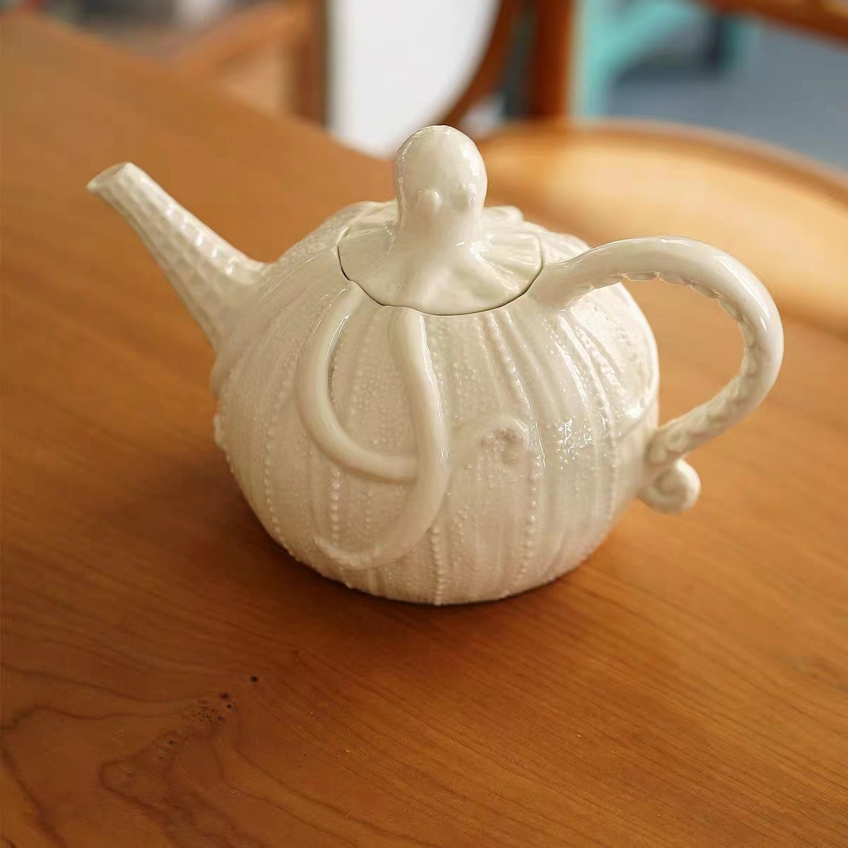 Creative Embossed Octopus Teapot Cute Ceramic Teapot Shaped as an Octopus 37.2 oz adds a nautical touch to your tea sessions