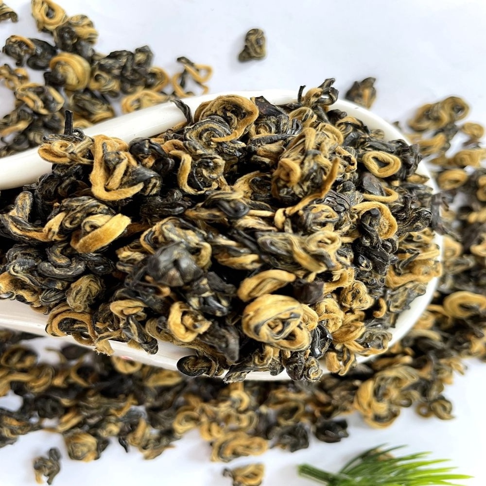 Factory direct price golden snail Hong jing luo black tea tasty Dian hong black snail tea best selling Dian hong black tea