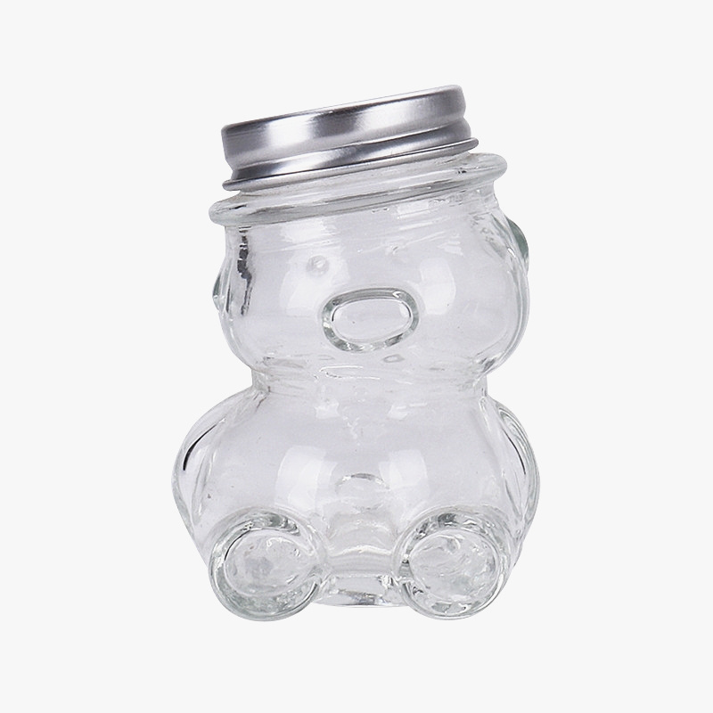 wholesale cheap 50ml 100ml teddy bear shaped frosco vidrio glass bottle honey bee candy sugar chocolate glass jar with lug lid