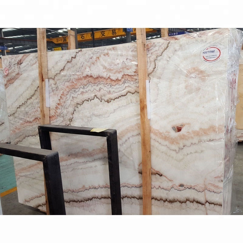 Onice stone wall panel bookmatch rainbow pink onyx slab