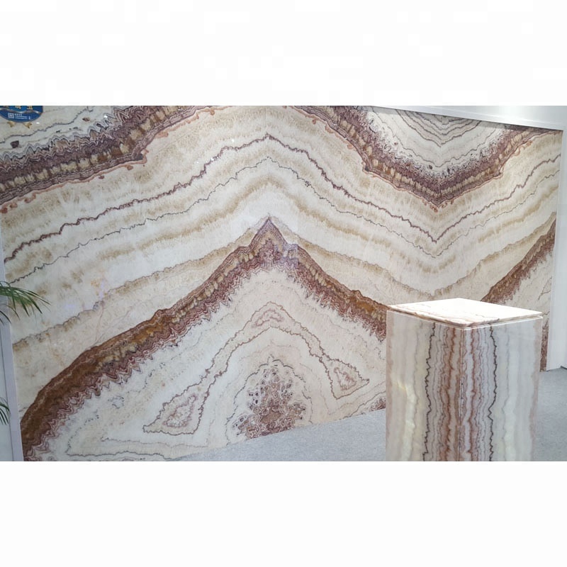 Onice stone wall panel bookmatch rainbow pink onyx slab