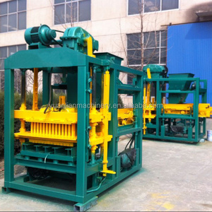 low price high press U shape brick machine QTJ4-25 small interlocking block machine automatic hollow brick molding machine price