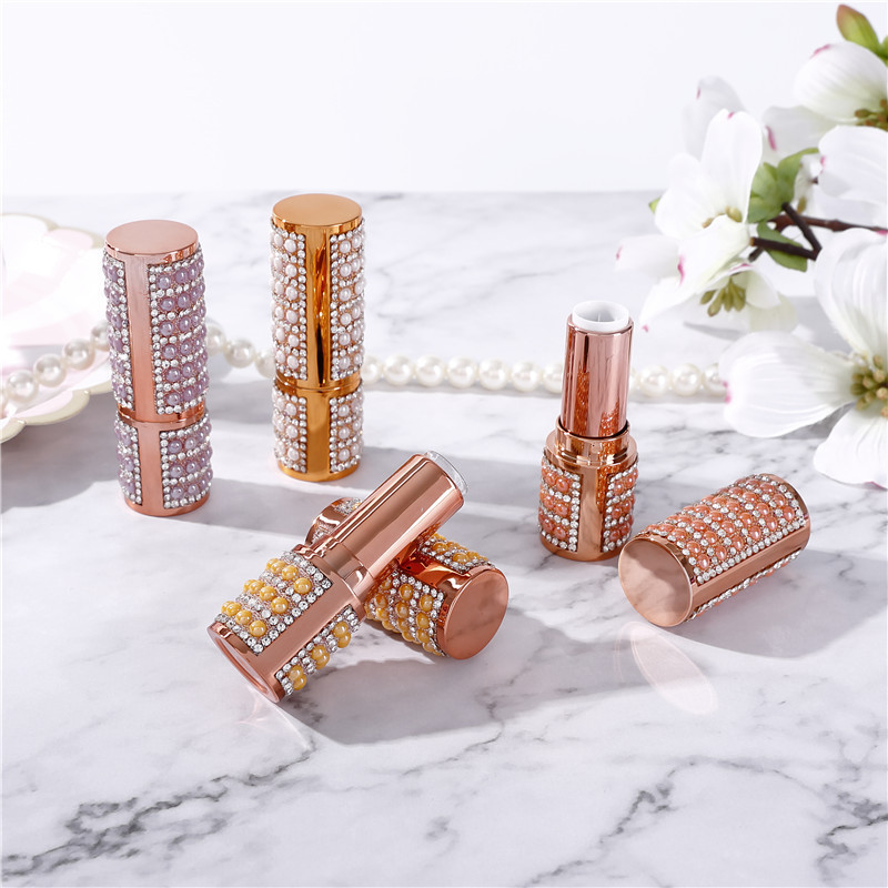 low moq 12.1 Luxury high quality round golden lipstick tube jewelry sparkle container packaging lip balm tube empty lipstick