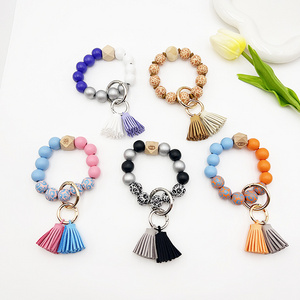 Fashionable and Popular Multipurpose Wooden Beaded Bracelet  Korean Velvet Tassel Keychain Devil's Eye Butterfly LOVE