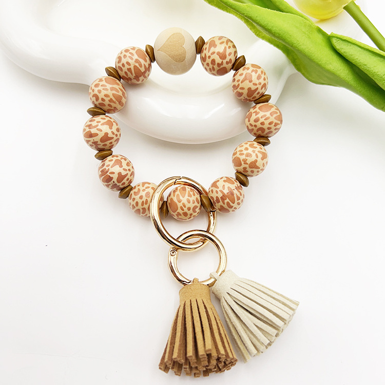 Fashionable and Popular Multipurpose Wooden Beaded Bracelet  Korean Velvet Tassel Keychain Devil's Eye Butterfly LOVE