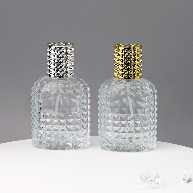 Wholesale 30ml 50ml grenade shape  thickened clear glass perfume bottle with aluminum screw cap and insert for sale