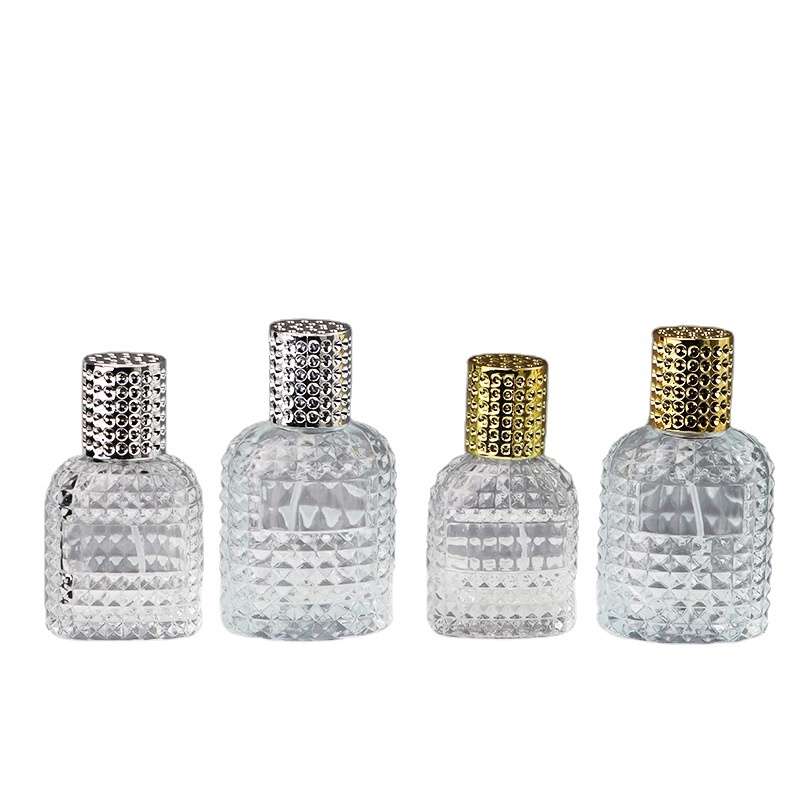 Wholesale 30ml 50ml grenade shape  thickened clear glass perfume bottle with aluminum screw cap and insert for sale