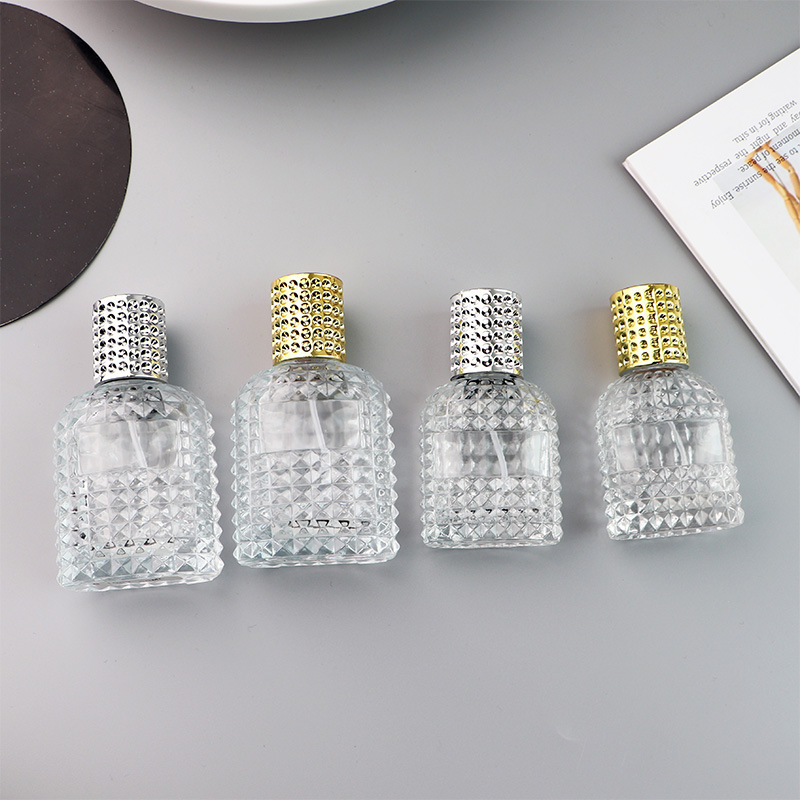 Wholesale 30ml 50ml grenade shape  thickened clear glass perfume bottle with aluminum screw cap and insert for sale