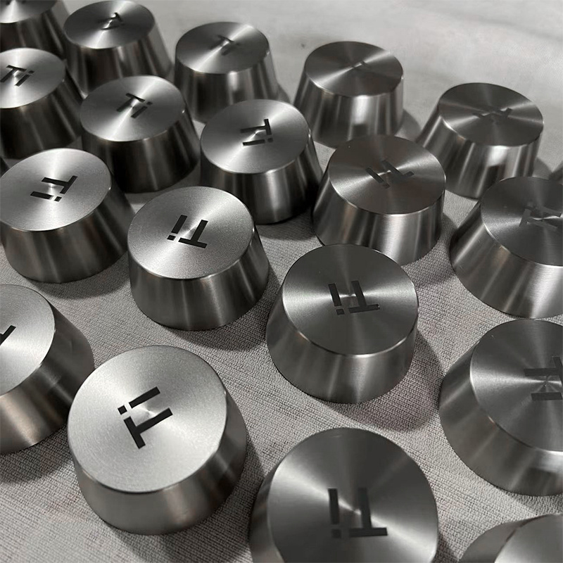 Titanium alloy round sputtering targets for PVD coating