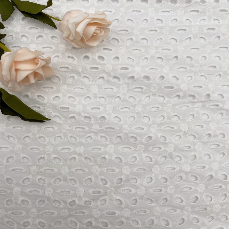 Shaoxing Yunda Mini Jacquard Eyelet Floral Fabric White Eyelet Cotton Embroidery Fabric For Lady Dress