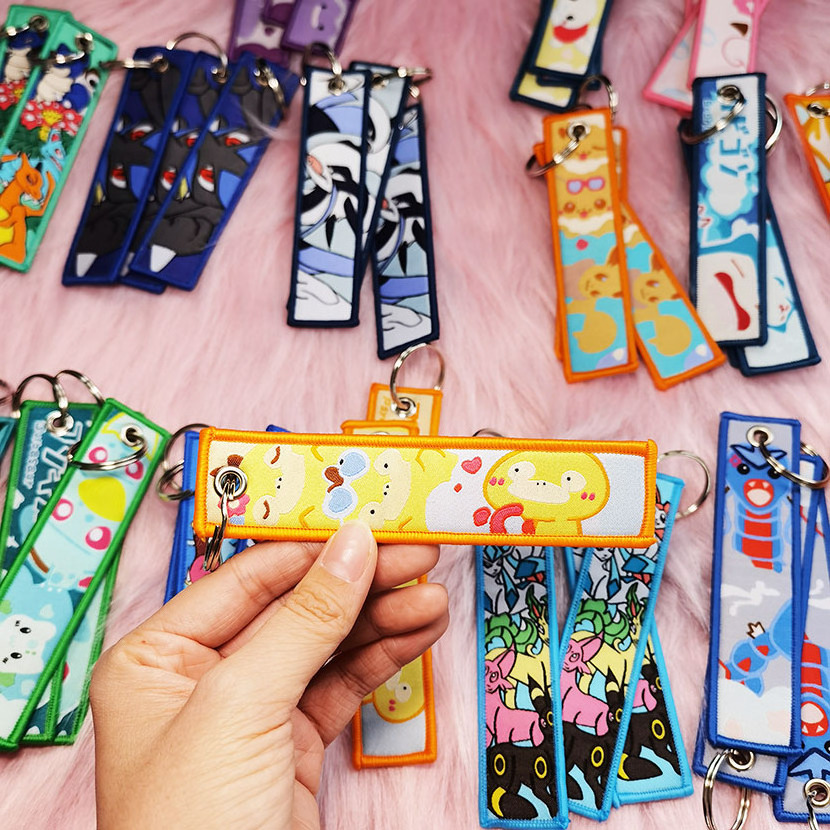 Stock Cartoon keychain Fabric Keychain Woven key chain luggage tag Anime Embroidery Keychain Embroidered Jet Tag Key Tag