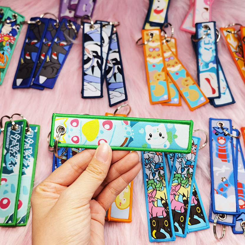 Stock Cartoon keychain Fabric Keychain Woven key chain luggage tag Anime Embroidery Keychain Embroidered Jet Tag Key Tag