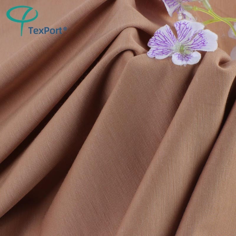 Wholesale 60S 62% Rayon 30% Nylon 8% Lycrta Stretch Plain Dyed Knitted Tencel Roma Fabric For Clothes Making 220Gsm