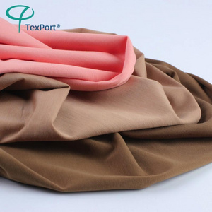 Wholesale 60S 62% Rayon 30% Nylon 8% Lycrta Stretch Plain Dyed Knitted Tencel Roma Fabric For Clothes Making 220Gsm