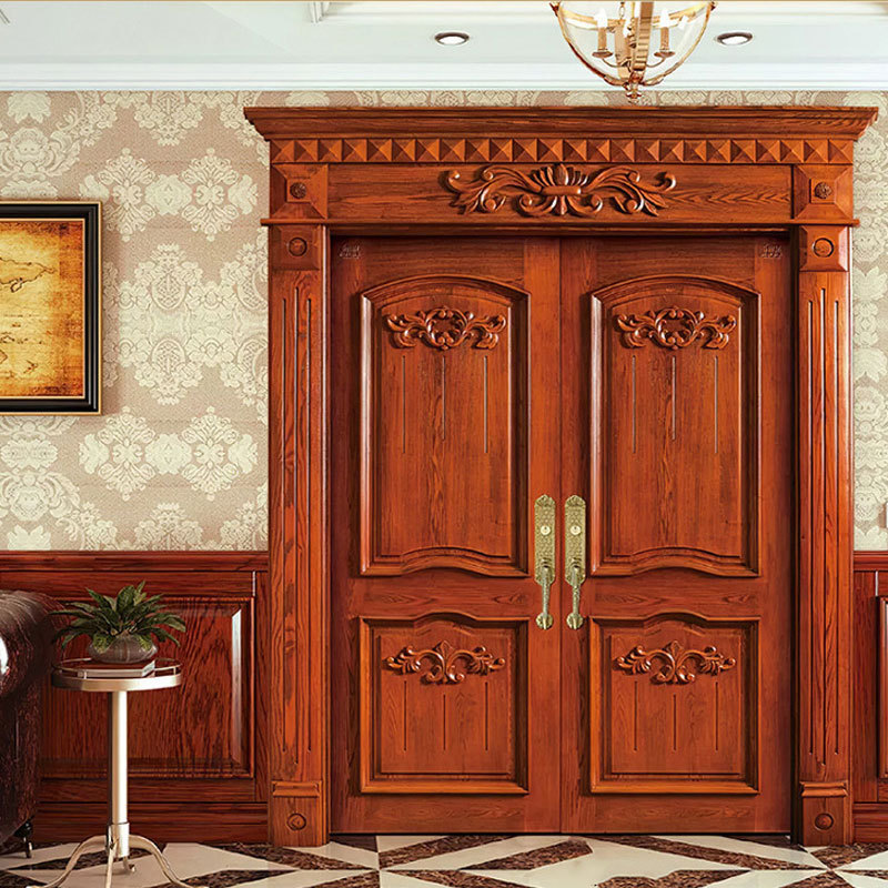 Custom teak plank solid wood doors carved from the main front double doors designed for villa house entry doors