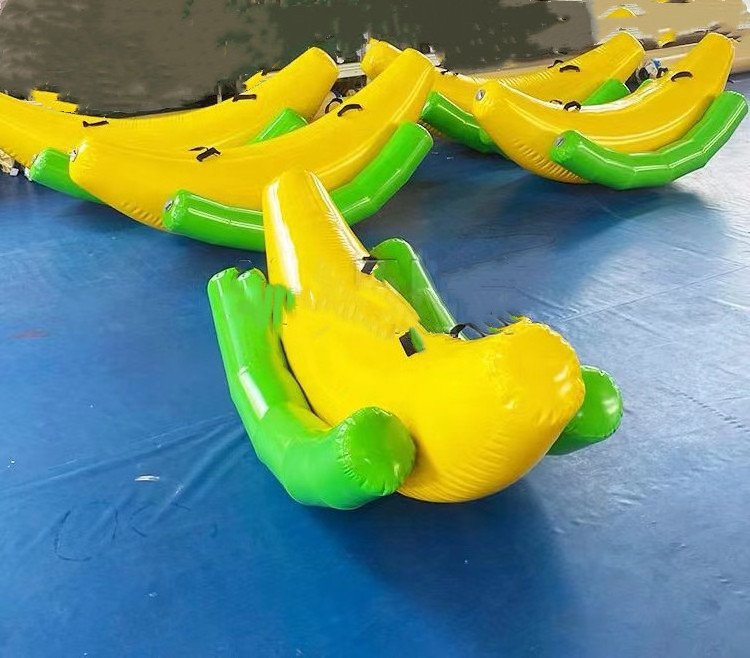 Hot Sale  Inflatable flying fish Banana Boat Inflatable Pirate Boat Seesaw Air Bouncer for Adult and Children Outdoor Game