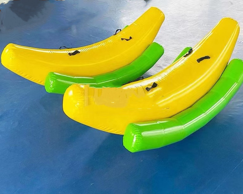 Hot Sale  Inflatable flying fish Banana Boat Inflatable Pirate Boat Seesaw Air Bouncer for Adult and Children Outdoor Game