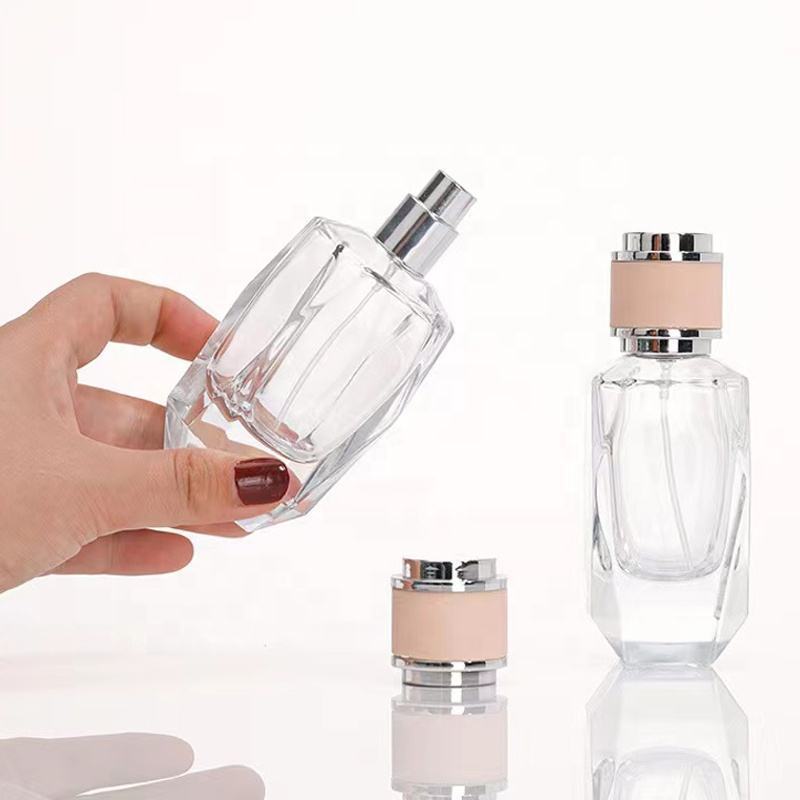 Factory direct wholesale High quality 50ml Empty Unique Shape Luvury Perfume Glass Bottle with Pink Cap