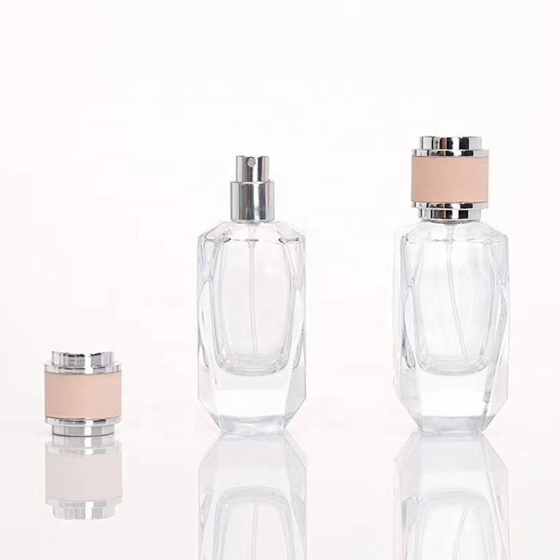 Factory direct wholesale High quality 50ml Empty Unique Shape Luvury Perfume Glass Bottle with Pink Cap