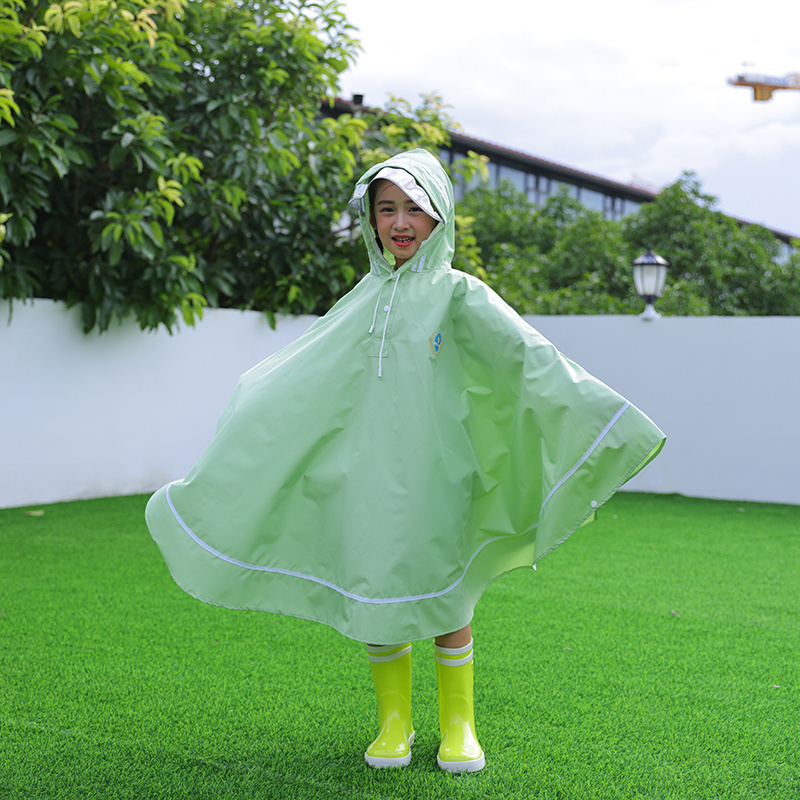 Wholesale children's outdoor cloak waterproof raincoat children's raincoatkids rain coat with school baghooded rain jacket