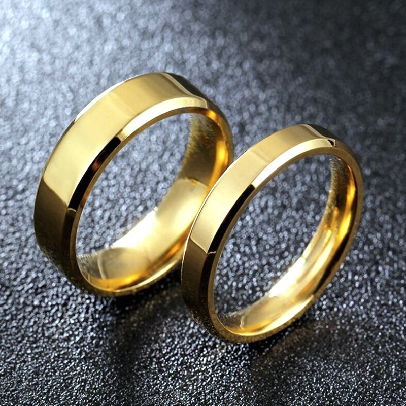 Provide Customize logo service gold Titanium steel couple ring Simple Engraved letter smooth blank stainless steel wedding ring