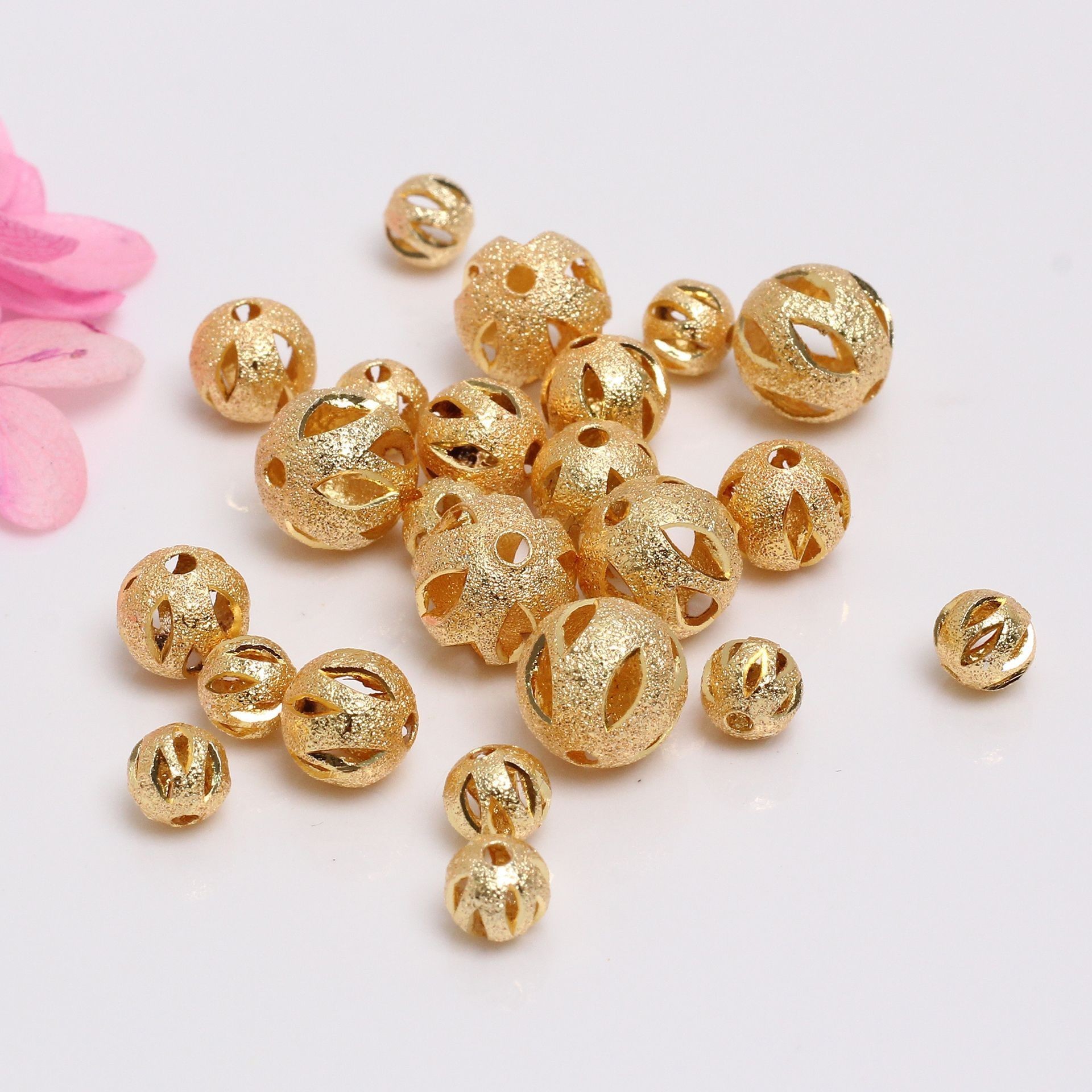 Wholesale 18 k gold retaining frosted hollowed out copper beads diy handmade jewelry accessories separation beads