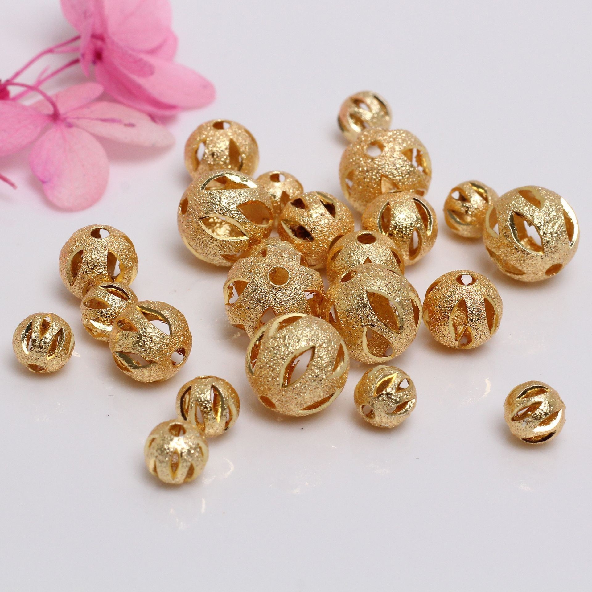 Wholesale 18 k gold retaining frosted hollowed out copper beads diy handmade jewelry accessories separation beads