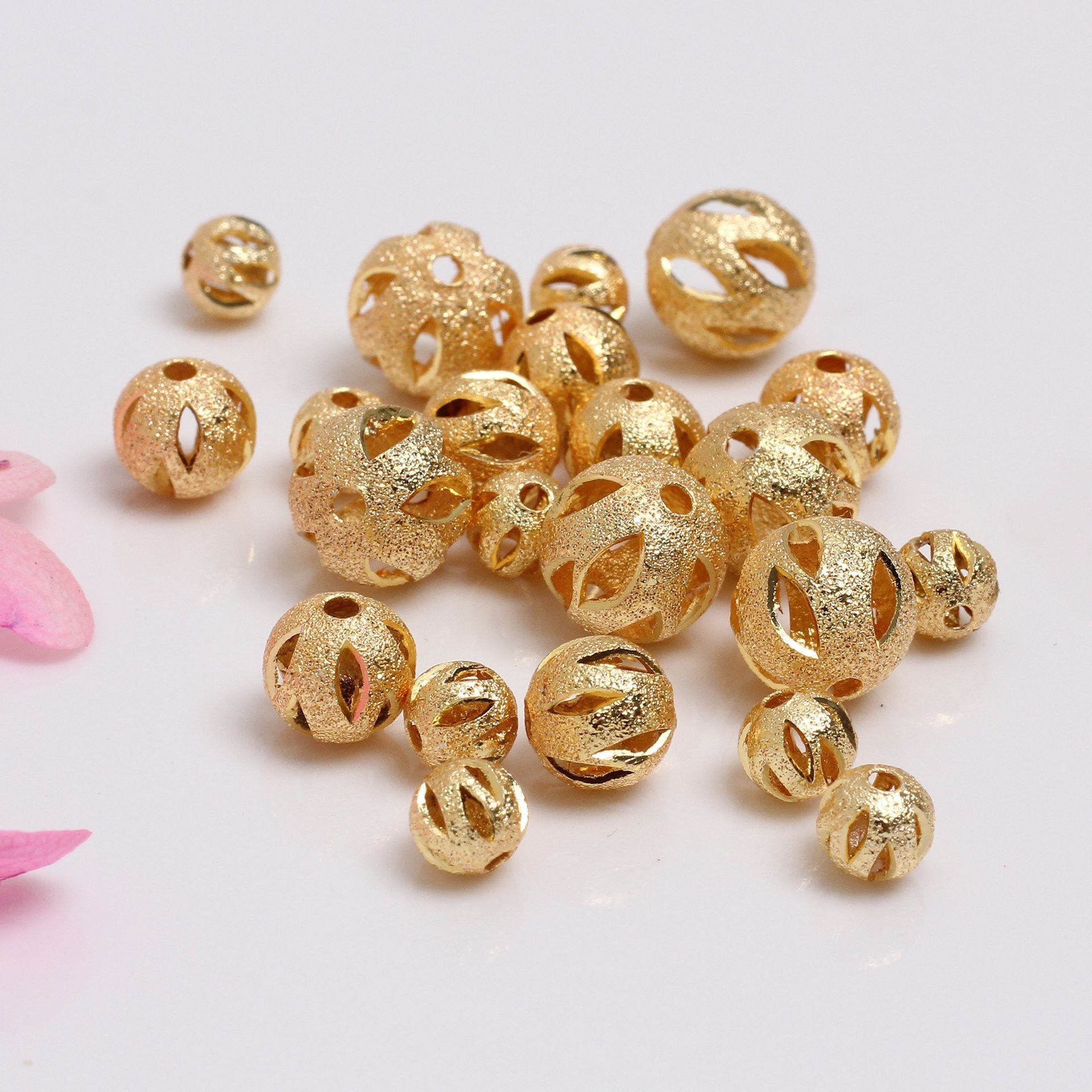 Wholesale 18 k gold retaining frosted hollowed out copper beads diy handmade jewelry accessories separation beads