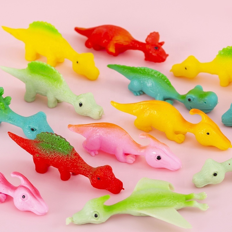 2024 new wholesale arrive flying dinosaur fingers squishi stress slingshot dinosaur flying games dinosaur kids bite finger toys