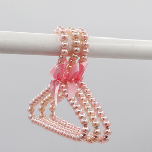 ZQ39 Pearl Clothes Hangers Lovely Faux Pearl Beaded Elegant Garment Clothes Hangers Ribbon Bowknot  Baby Kids Clothes Rack