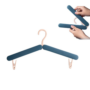 DS1258 Wardrobe Storage Rack Drying Clip Hook ABS Travel Clothes Hanger Stretch Drying Rack Folding Clothes Hanger With Clip