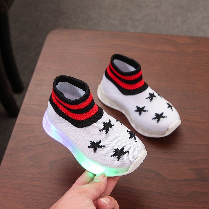 Autumn new children's five-pointed star boys and girls soft-soled luminous sports shoes LED lights flying shoes