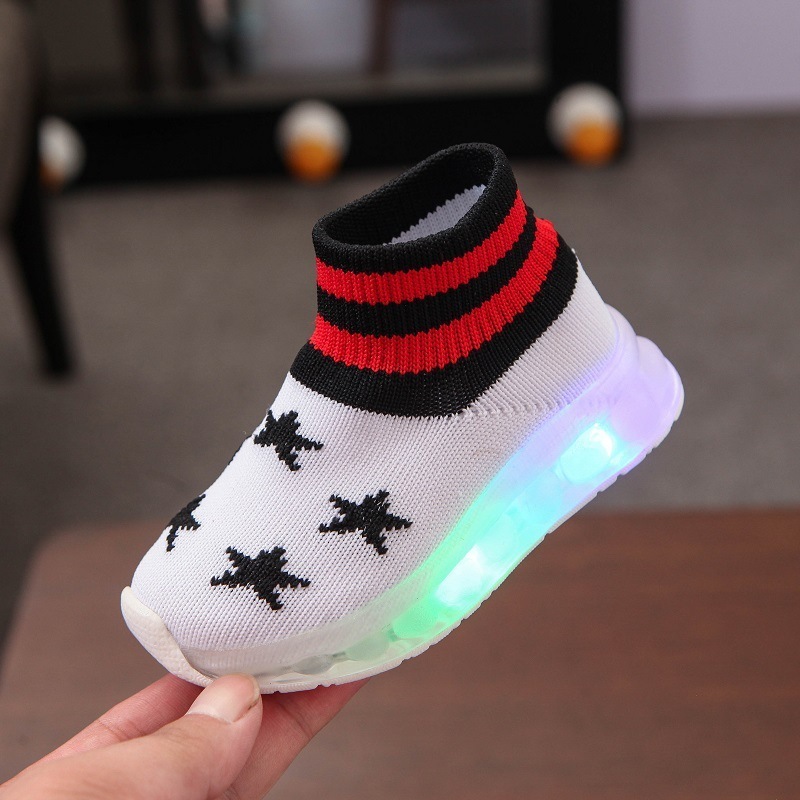 Autumn new children's five-pointed star boys and girls soft-soled luminous sports shoes LED lights flying shoes